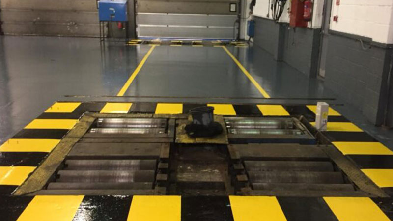 Black and yellow safety line marking Gallery Image